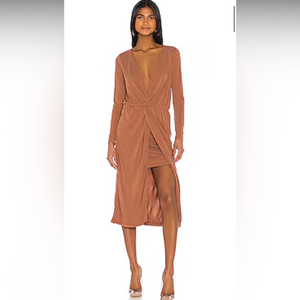 The Judy Midi Dress in Terracotta
L'Academie
Color:Terracotta